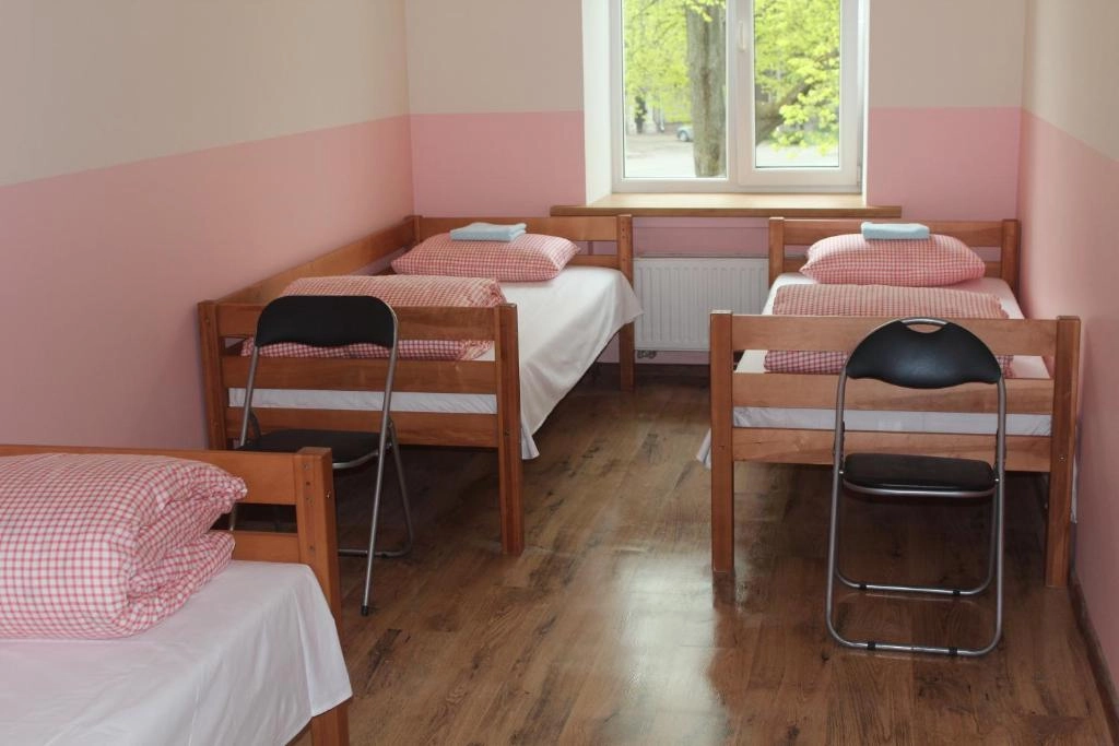 Četrvietīga istaba ar koplietošanas vannas istabu